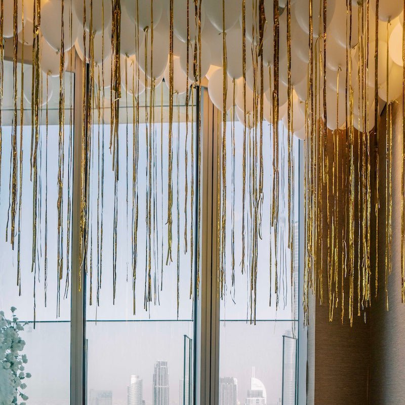 Helium Balloons with Foil Strings - The Pop Shop Dubai / Luxury Balloon Decor
